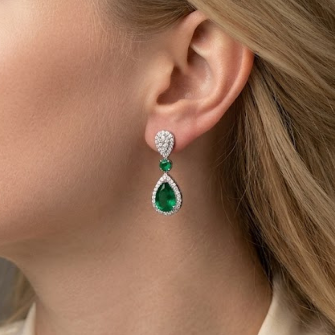 0.44ct Pear Cut Emerald and Diamond Halo Drop Earrings in 9K White Gold